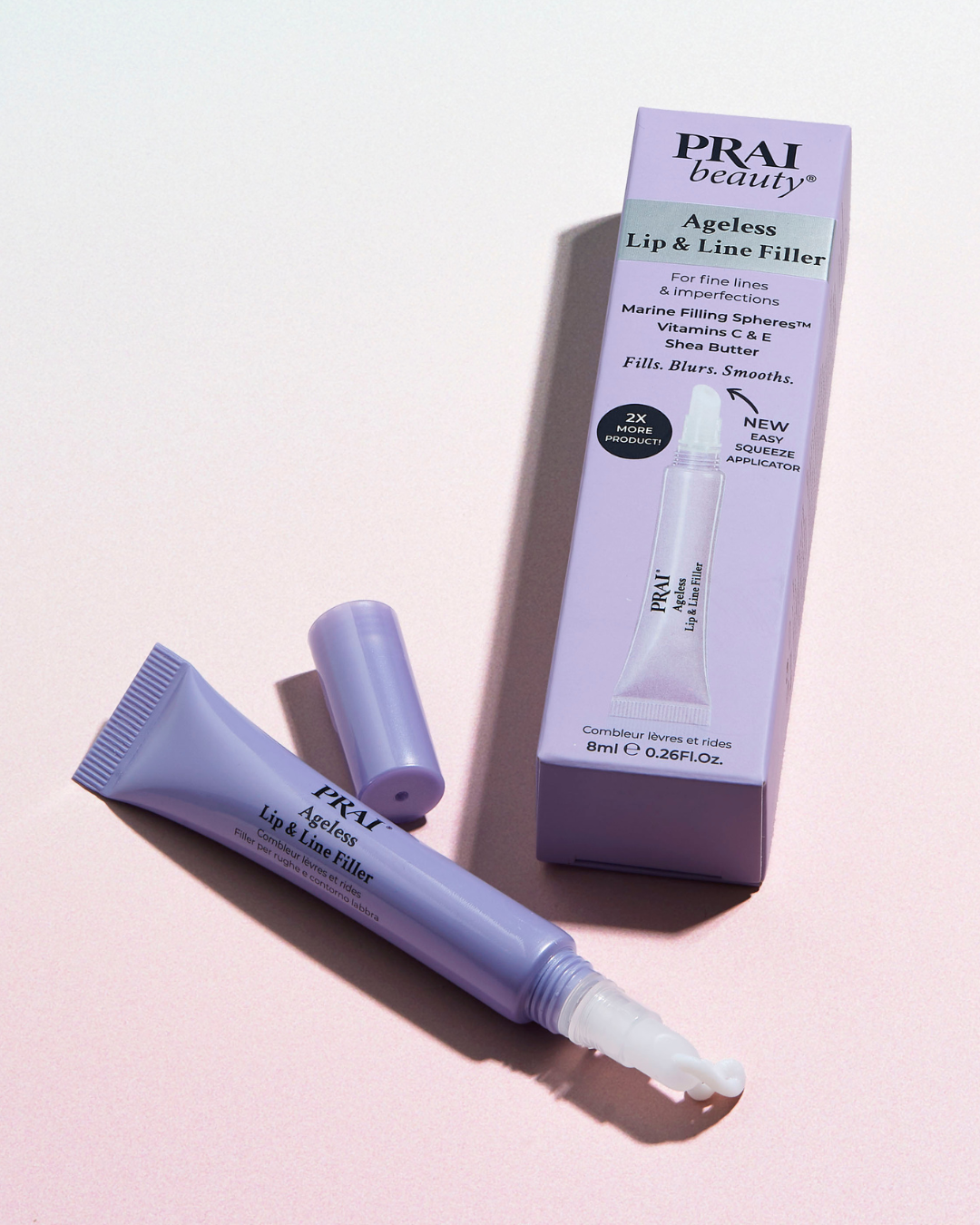 PRAI Beauty Ageless Lip & Line Filler, box and two tubes on a pink background