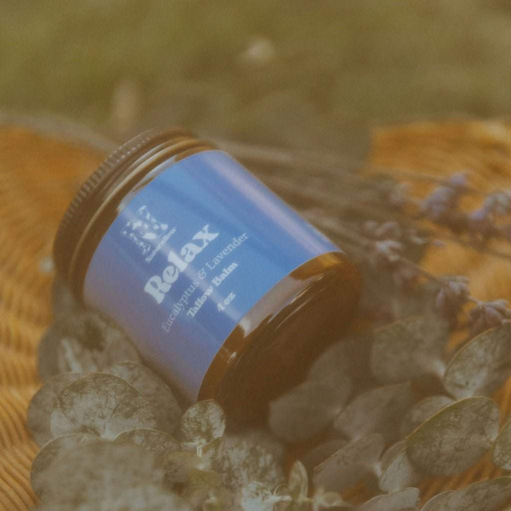 Naturallow Tallow Body Balm, Relax jar lying among clear crystals