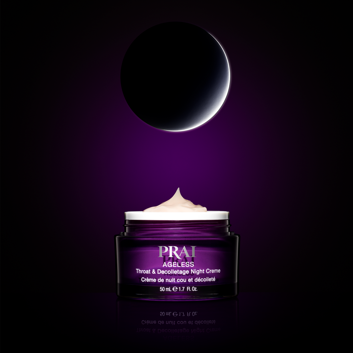 PRAI Beauty Ageless Throat & Decolletage Night Creme with Retinol, open jar under a crescent moon on a dark purple background
